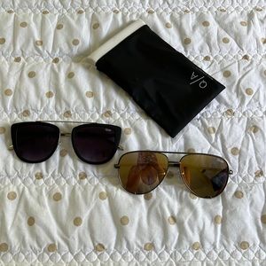 two brand new pairs of quay sunglasses